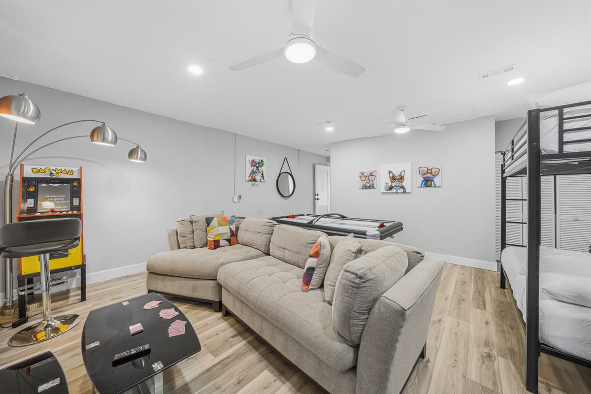 Challenge your group to air hockey before relaxing on the oversized sectional sofa.