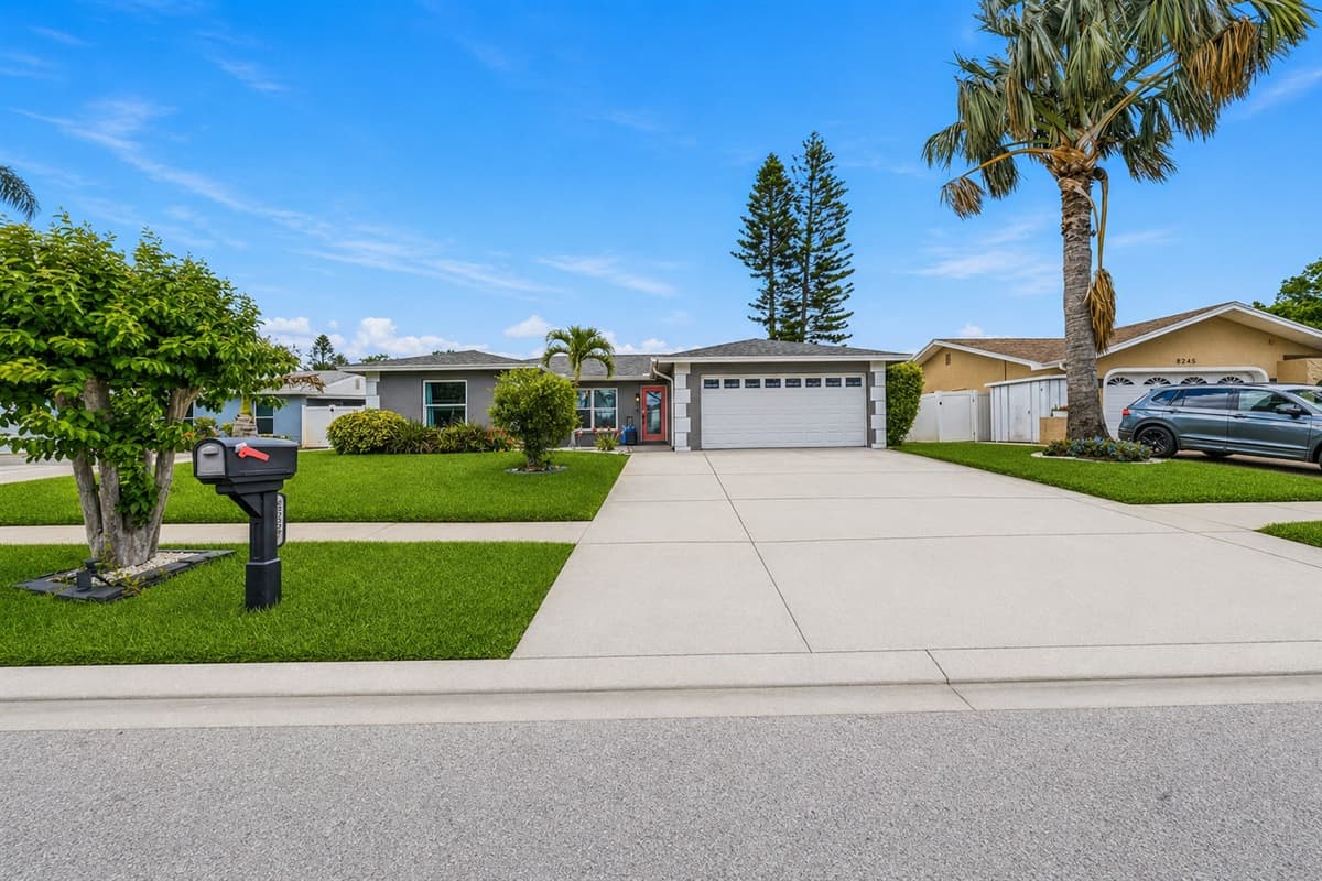 Street view showcasing the home’s curb appeal in a quiet residential neighborhood.