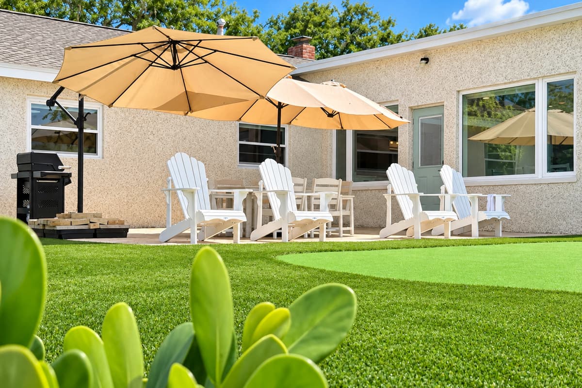 Waterfront patio with outdoor dining and places to relax.