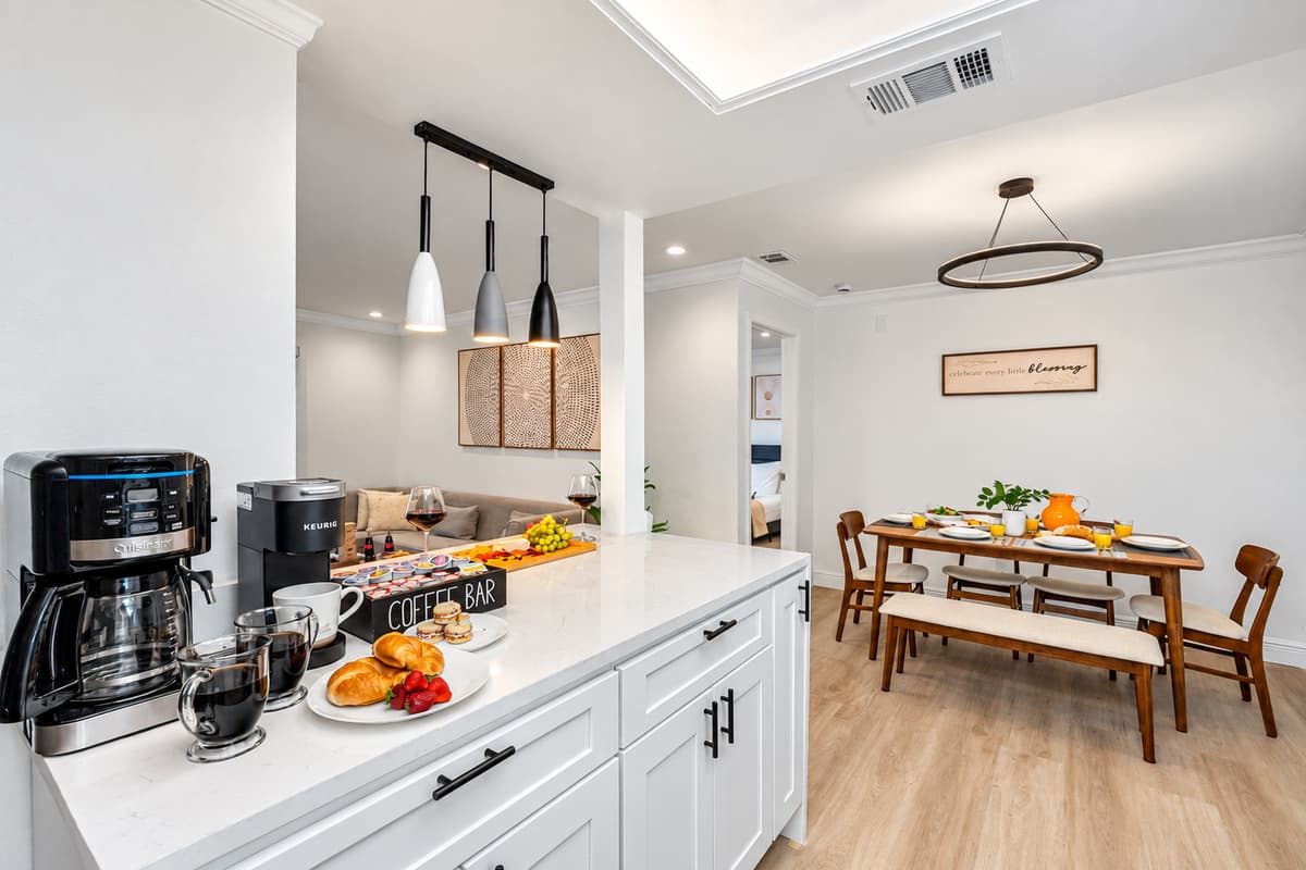 Open sightlines to the living room keep you connected while you prep meals or pour a drink.