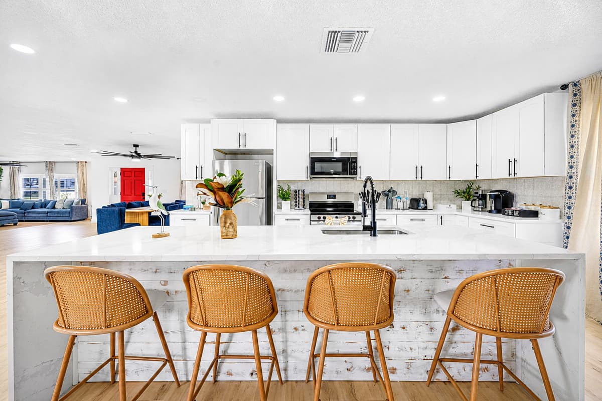 Where everyone gathers before anyone sits down to eat. Stainless appliances, clear counters, room to move.