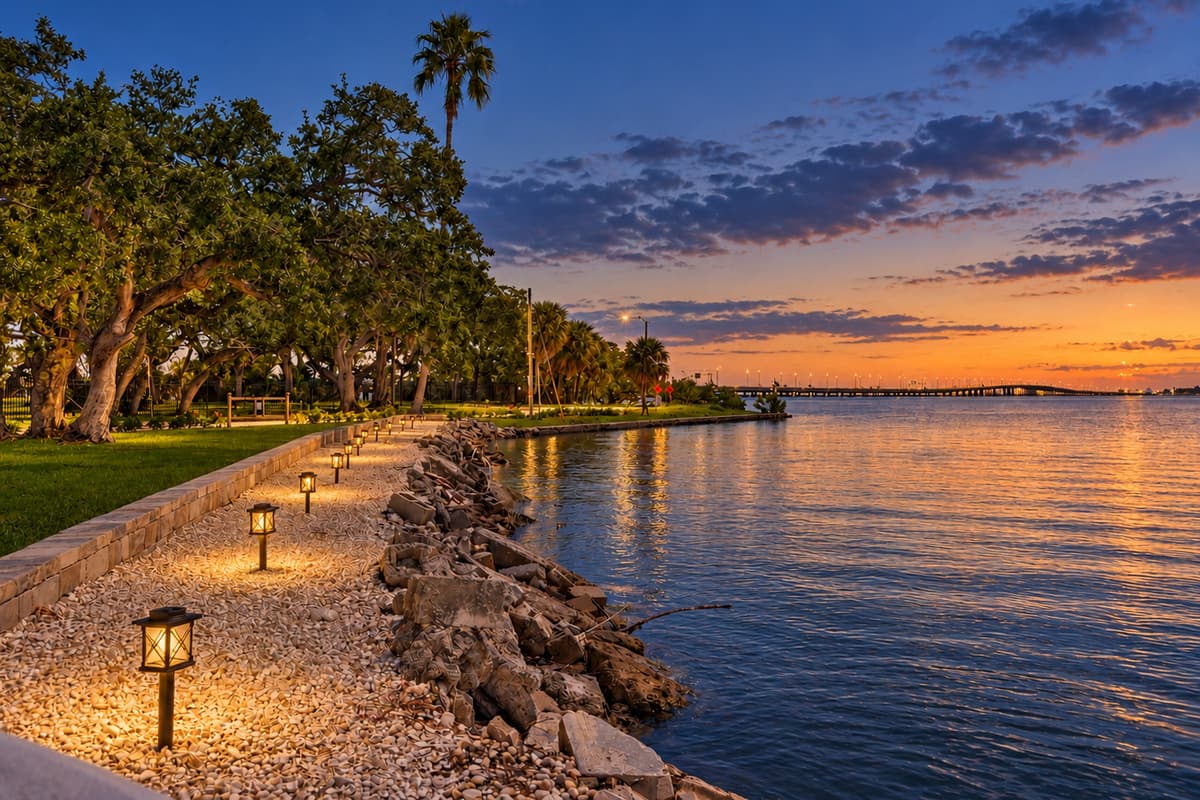 Waterfront seawall and evening water views.
