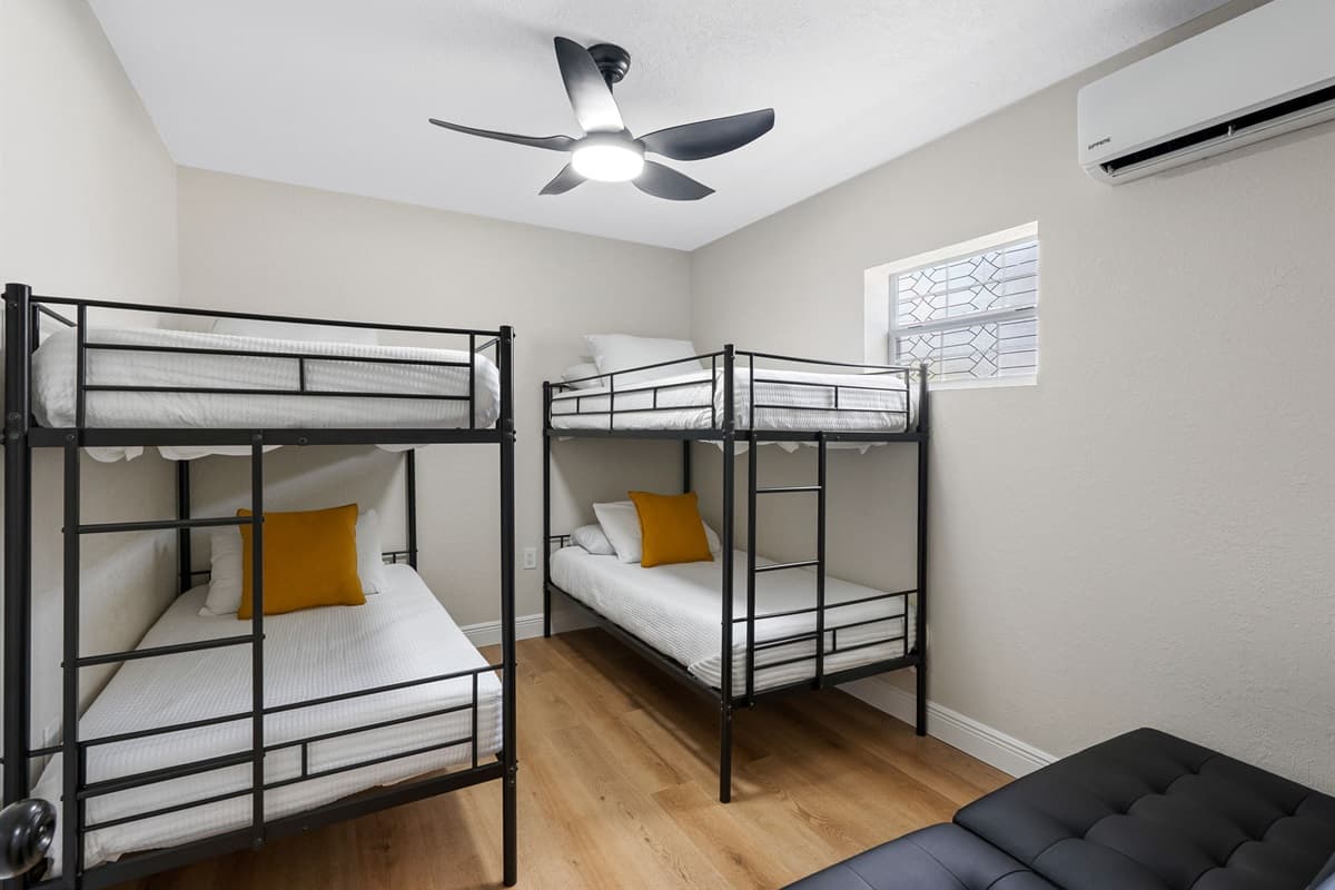 This bedroom is the ultimate fun and functional space—perfectly tailored for kids, teens, or groups traveling together.