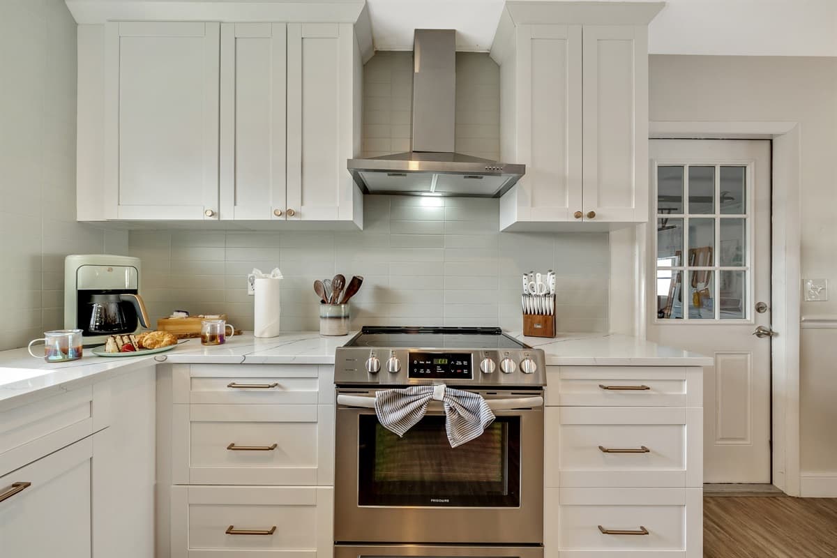 The kitchen, a spacious sanctuary that seamlessly blends functionality with exquisite design.