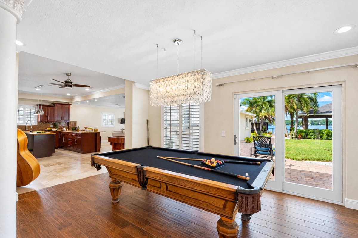 At the center of this fun-filled space is a full-size pool table, ready for everything from casual practice shots to exciting tournaments with family and friends.