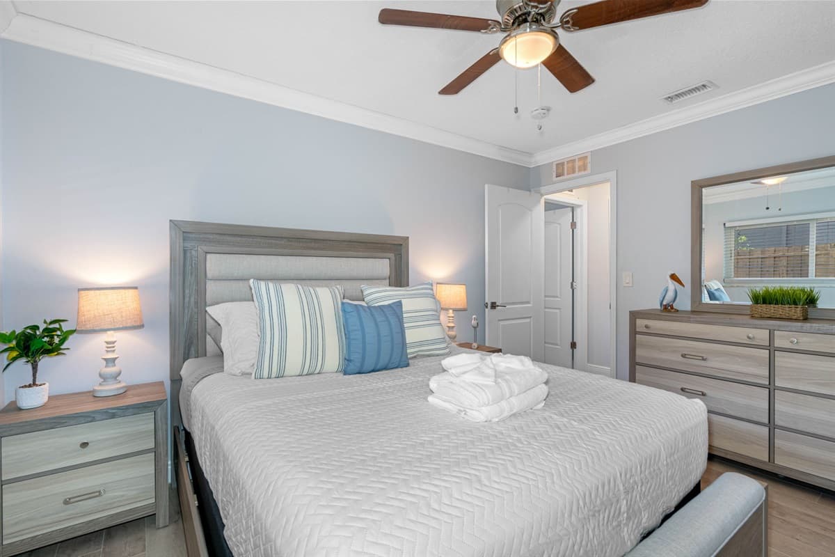 This bedroom is a haven of tranquility designed to offer you restful nights and a peaceful retreat.