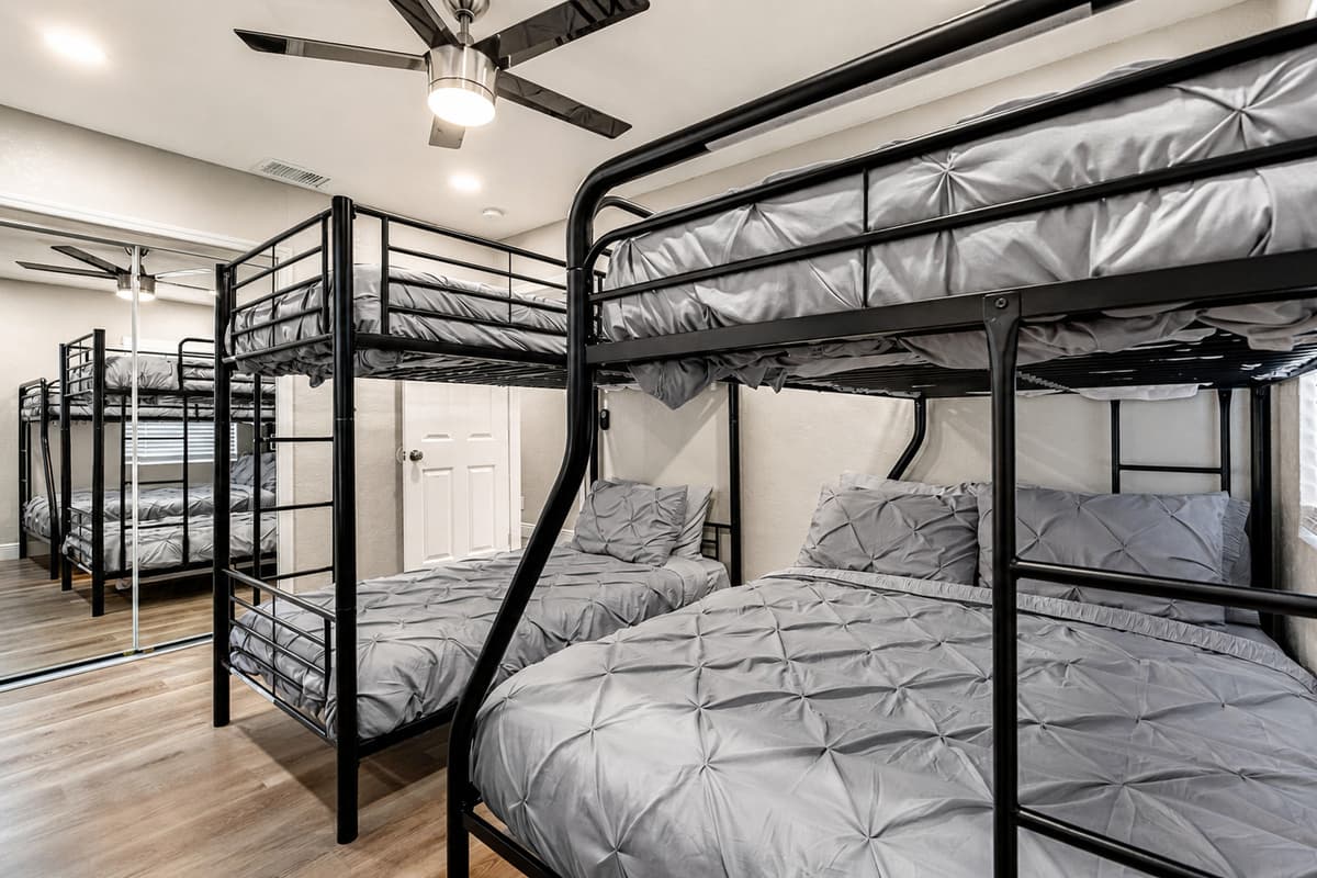 New setup for this bedroom: 1 queen bed and 1 bunk bed (twin over twin). New photos coming soon!