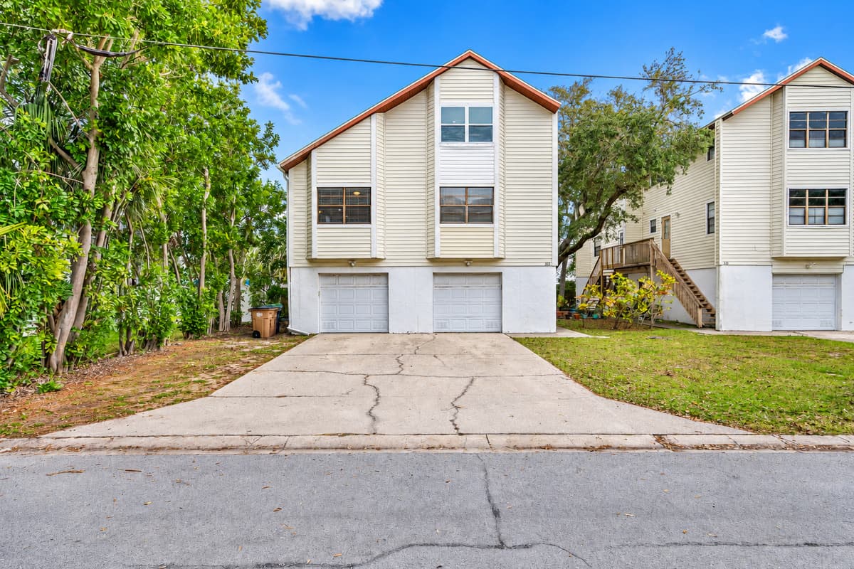 The exterior exudes an inviting warmth, reflecting the essence of a home that embraces both style and comfort.