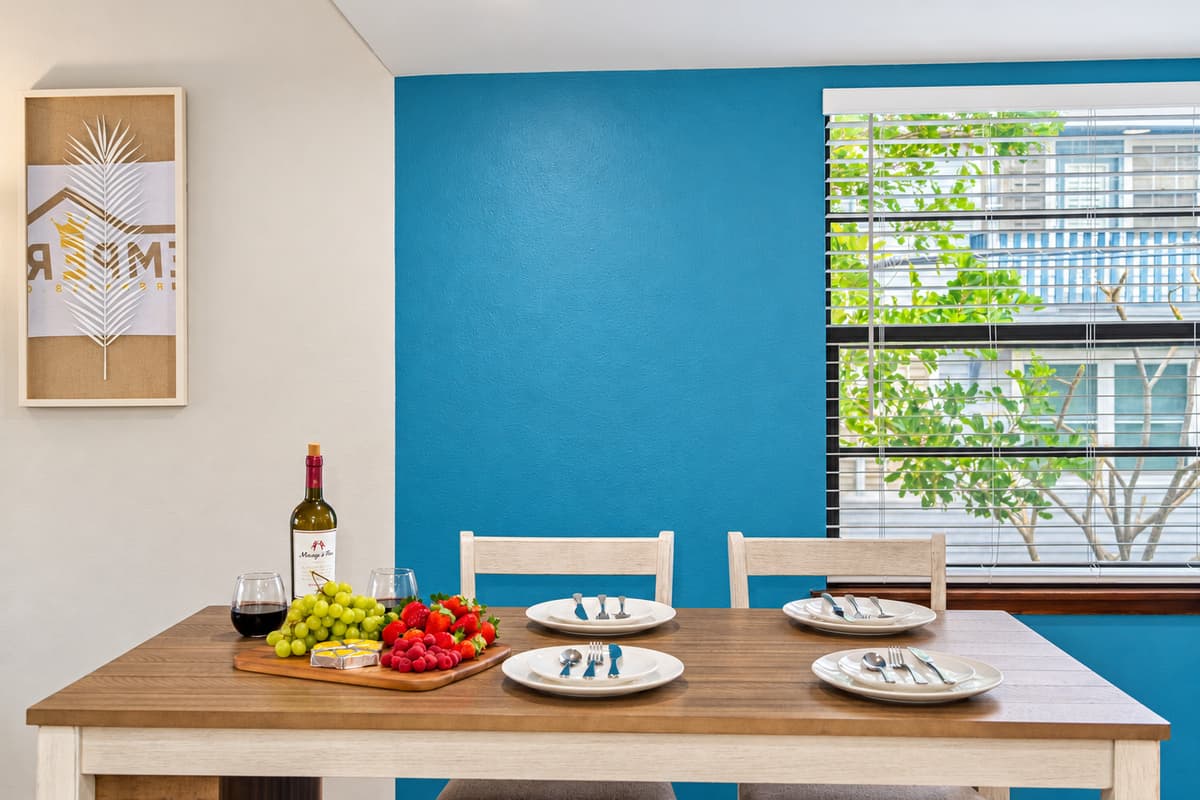 The chairs, carefully chosen for their comfort and aesthetic appeal, offer the perfect balance of support and relaxation, ensuring that every meal is savored in utmost comfort.