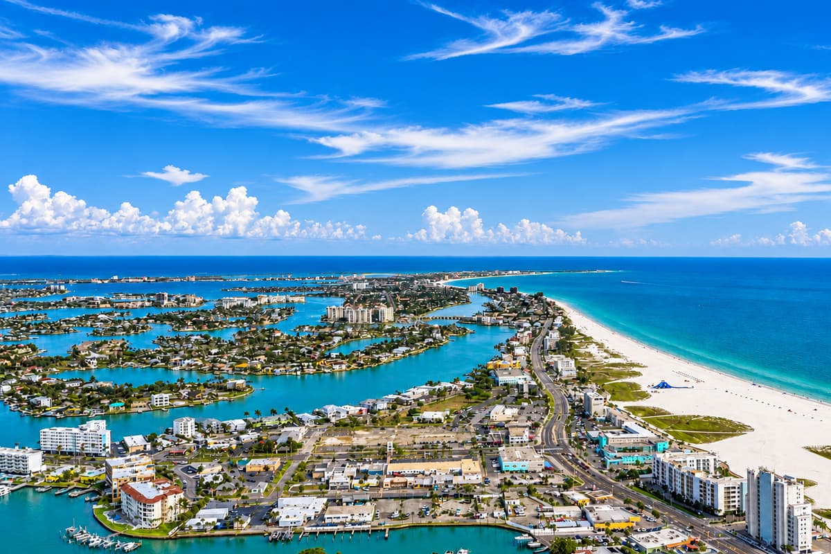 Turquoise water wraps around this whole neighborhood. Beaches, marinas and waterfront dining sit minutes from the front door. You are not looking at the postcard from the highway. You are staying inside it.