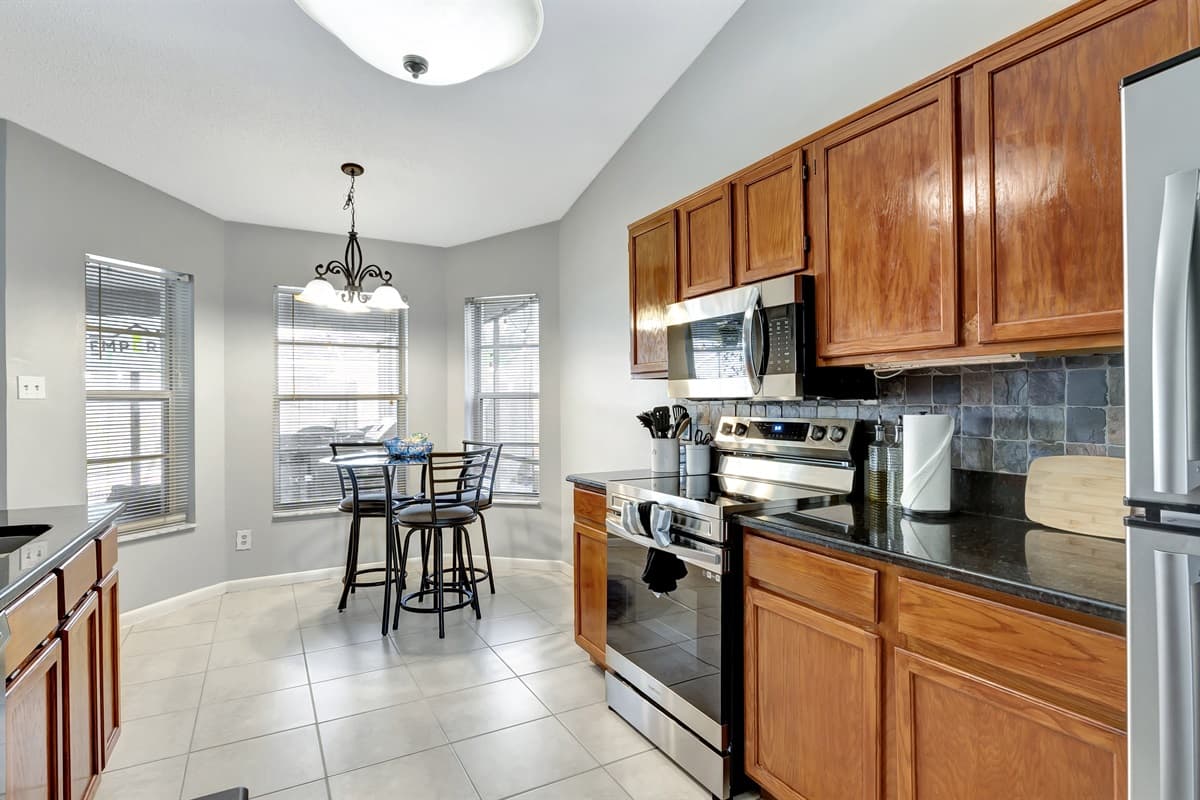 Embrace the art of cooking surrounded by top-of-the-line modern appliances, where every meal becomes a masterpiece.