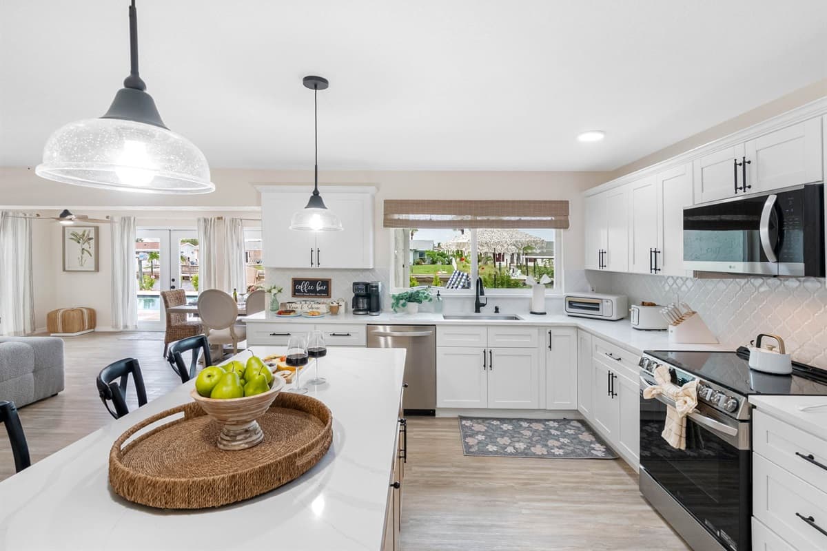 The open design makes this kitchen the heart of the home, ideal for gathering over morning coffee or preparing family dinners.
