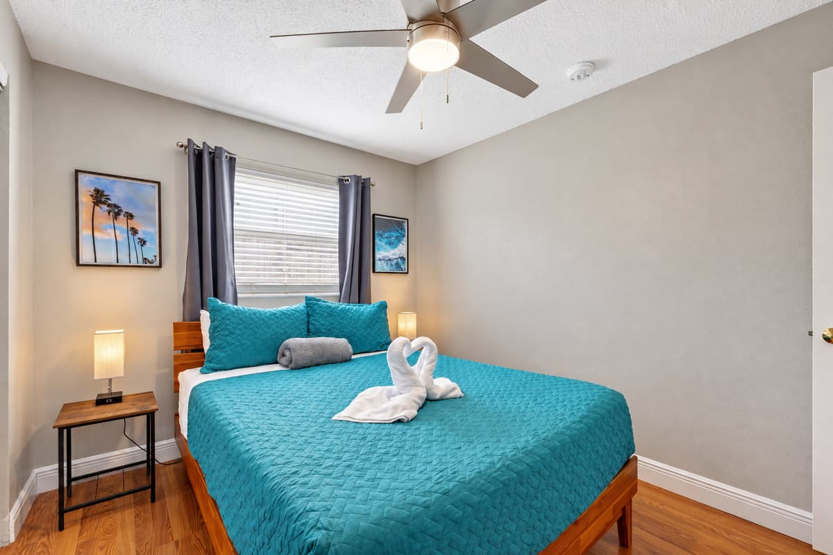 Featuring a queen-size bed, as the centerpiece of this inviting space,