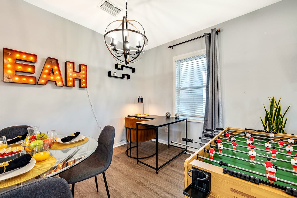 Crafted with precision and sporting a classic design, the table invites enthusiasts to engage in thrilling matches that echo the cheers and excitement of a stadium.