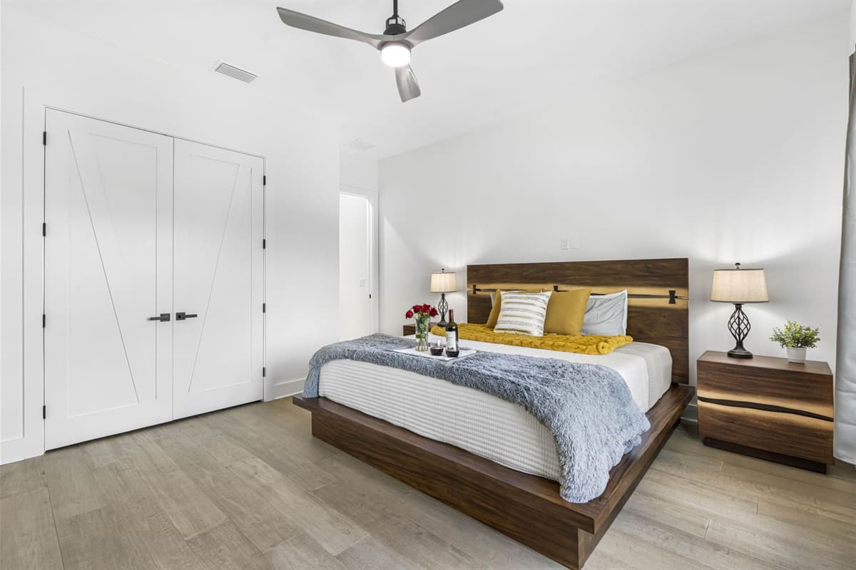 Another spacious retreat, this king bedroom also offers a king bed and is tastefully decorated with soft tones and cozy furnishings.