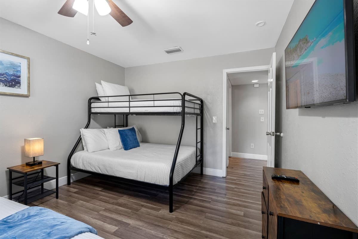 This versatile bedroom offers multiple sleeping options, making it perfect for larger parties.