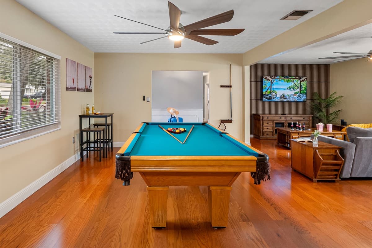 Spend quality time together enjoying games in this spacious and inviting pool area.
