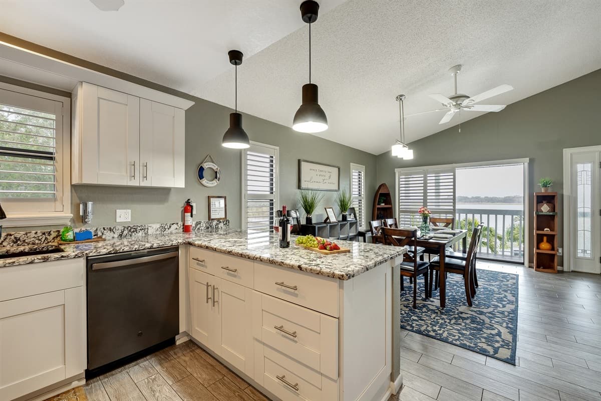 Within this well-appointed space, a myriad of contemporary appliances awaits, elevating the functionality of the kitchen.