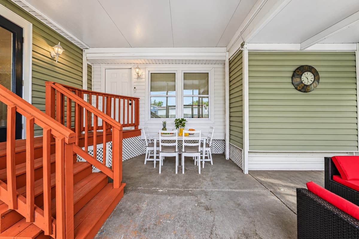 Outdoor dining and lounge area with direct access to the home—ideal for gatherings.