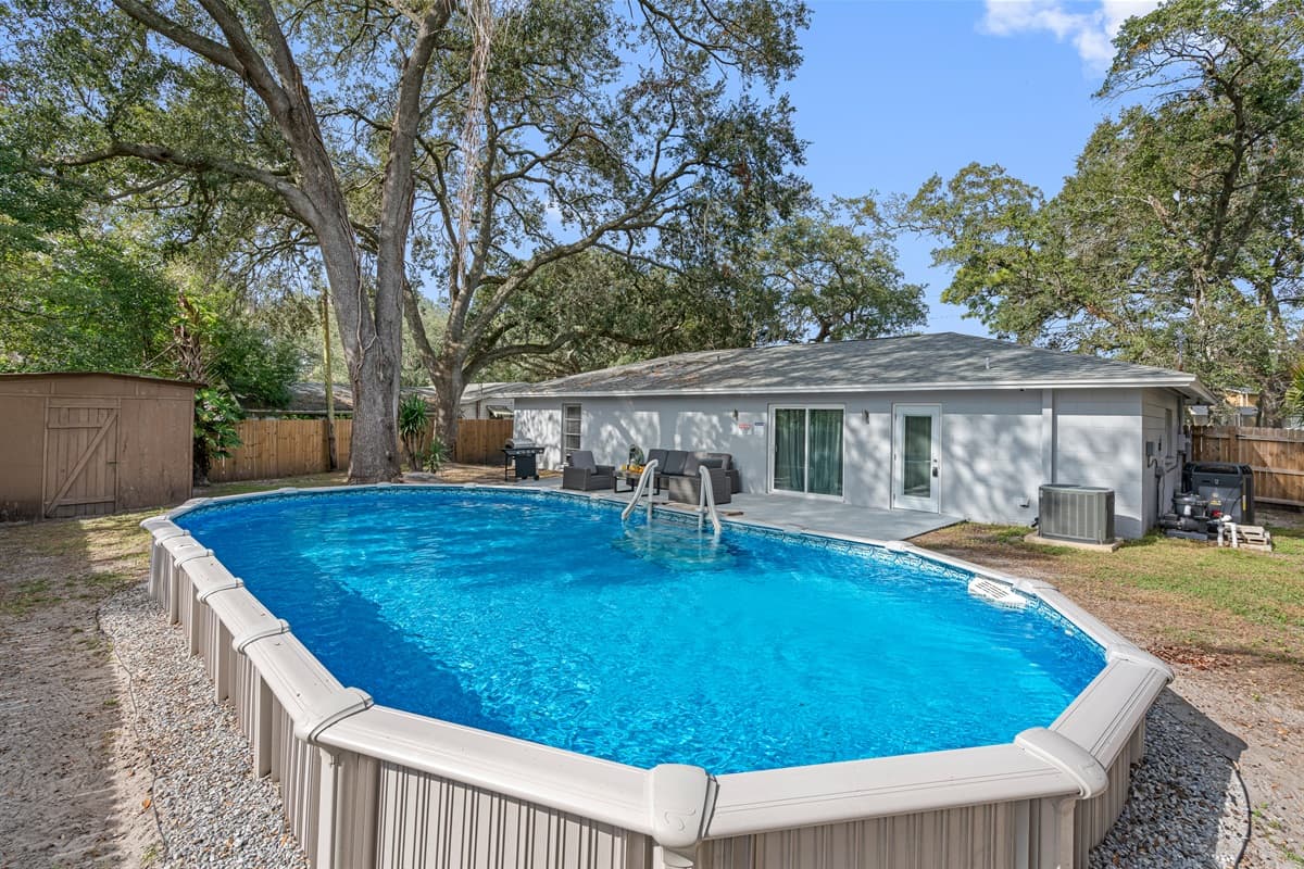 Immaculate heated pool, beautiful trees and a grill you could use while creating wonderful memories with your family and friends in a fully fenced backyard. If you love what you see, send us an inquiry now!