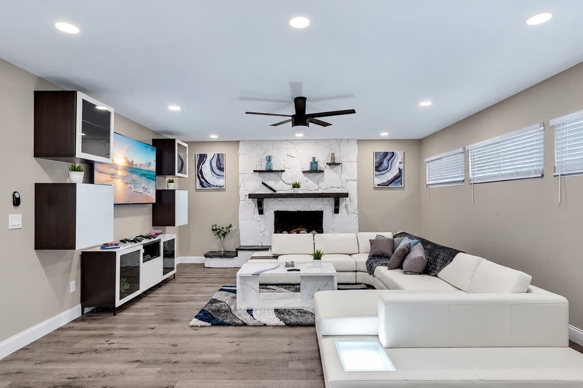 Modern living room equipped with a large flat-screen smart TV where you can chill and catch up on your favorite TV series.. If you have any questions at all, please send us an inquiry today!