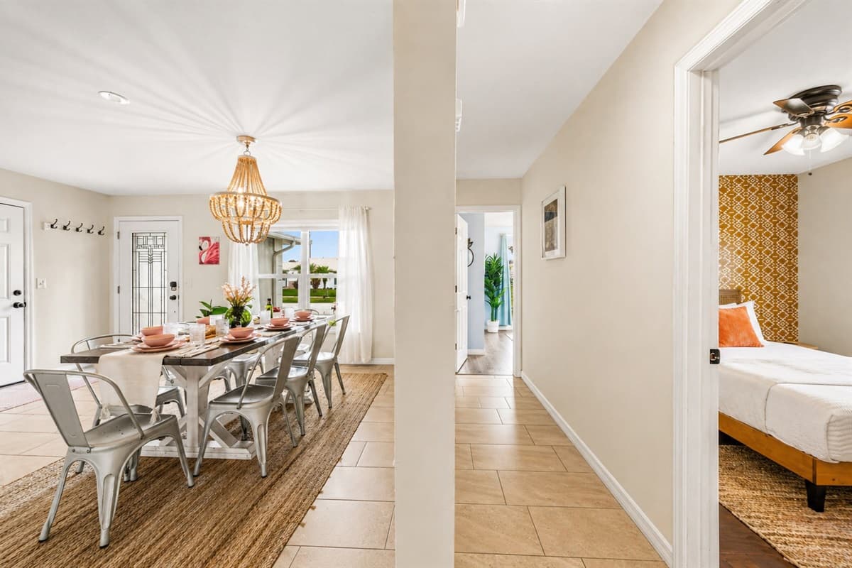 Dining area view from the hallway showing easy access to nearby bedrooms and common spaces.