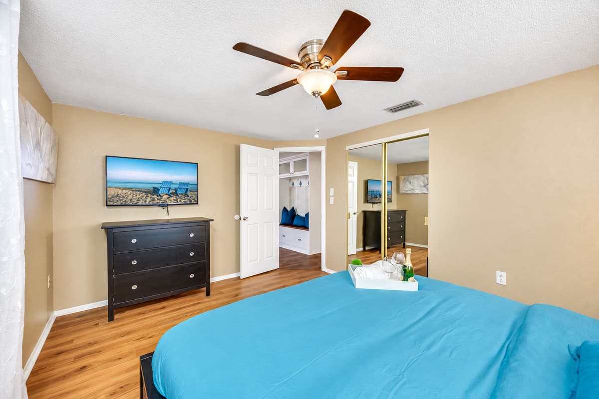 Feel safe and comfortable in this impeccable bedroom that has a queen sized bed, closet and drawers, and its own TV! Its like sleeping in your home away from home!