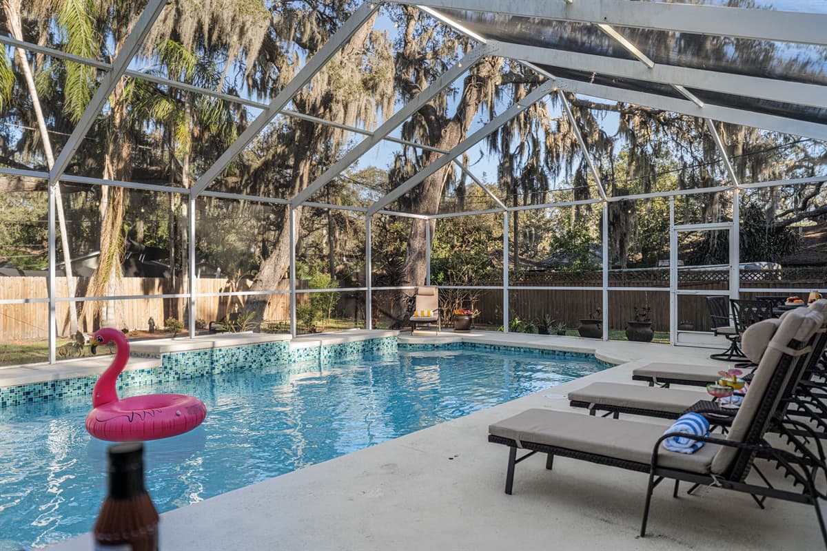 Enjoy your own private, screened-in pool oasis—perfect for swimming, lounging, and soaking up the Florida sunshine.