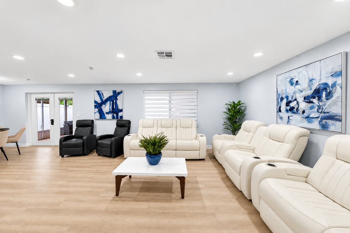 Expansive gathering space designed for groups and families, offering plenty of seating and room to relax together.