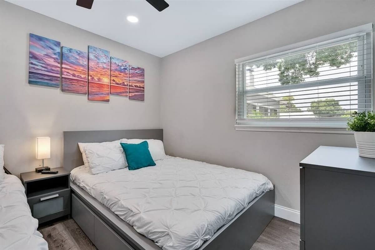 Who wouldn't love this elegant room with queen sized bed, singleover twin bunkbed, drawers for storage and its own TV! If you like what you see, send us a message now!