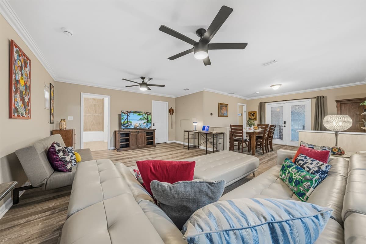 Expansive living area with ample seating, open layout, and modern finishes—great for groups and families.