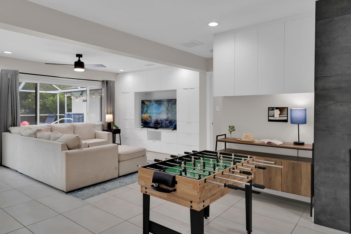 From foosball matches to movie nights, this living space is made for fun and connection