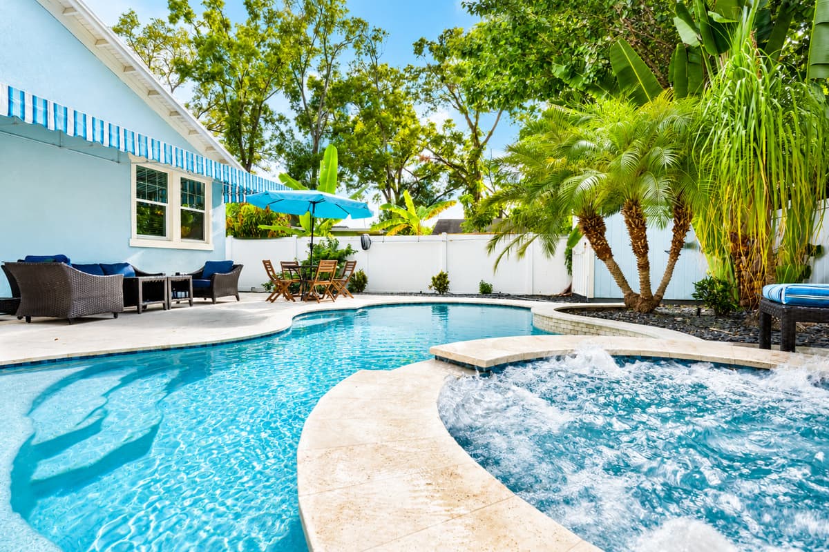 Enjoy the tranquil ambiance created by the pool's elegant design and soothing spa overflow.