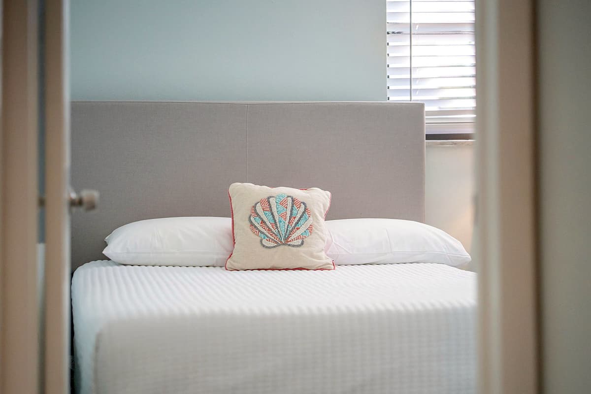 Each bed is dressed in soft, high-quality linens to ensure a restful and cozy night’s sleep.