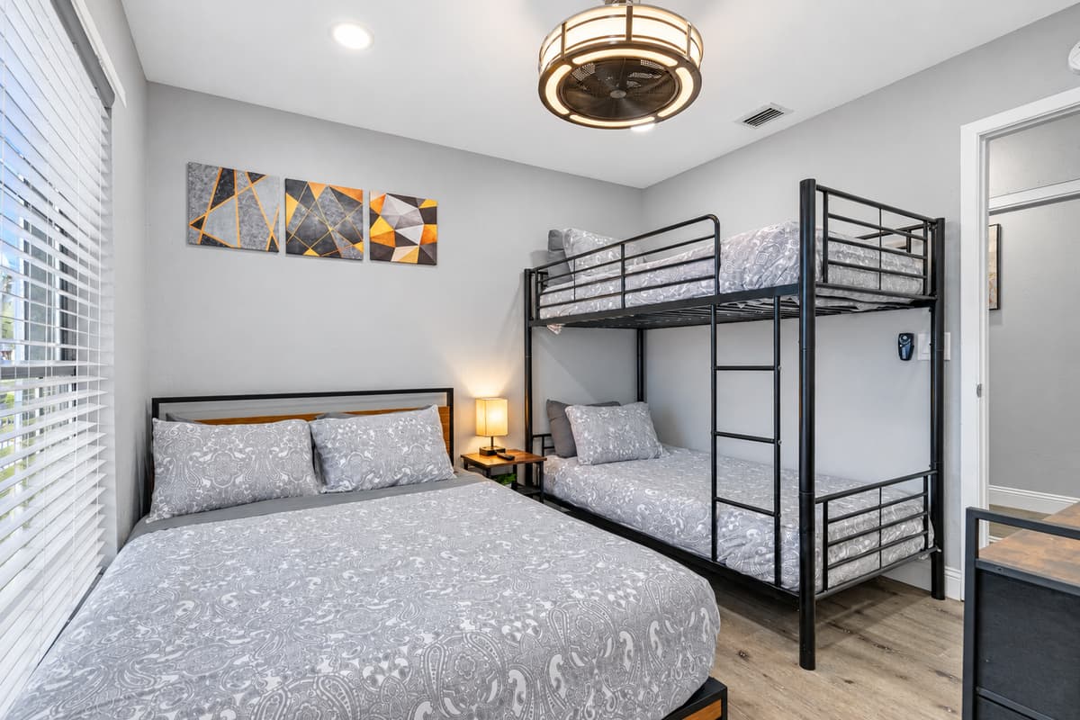 Single bunkbed and a queen size bed for a small family or a group of friends who wants to hang out and sleep in one room. It is very spacious and has a very nice view. If you are interested to book this house, Send us a message now!
