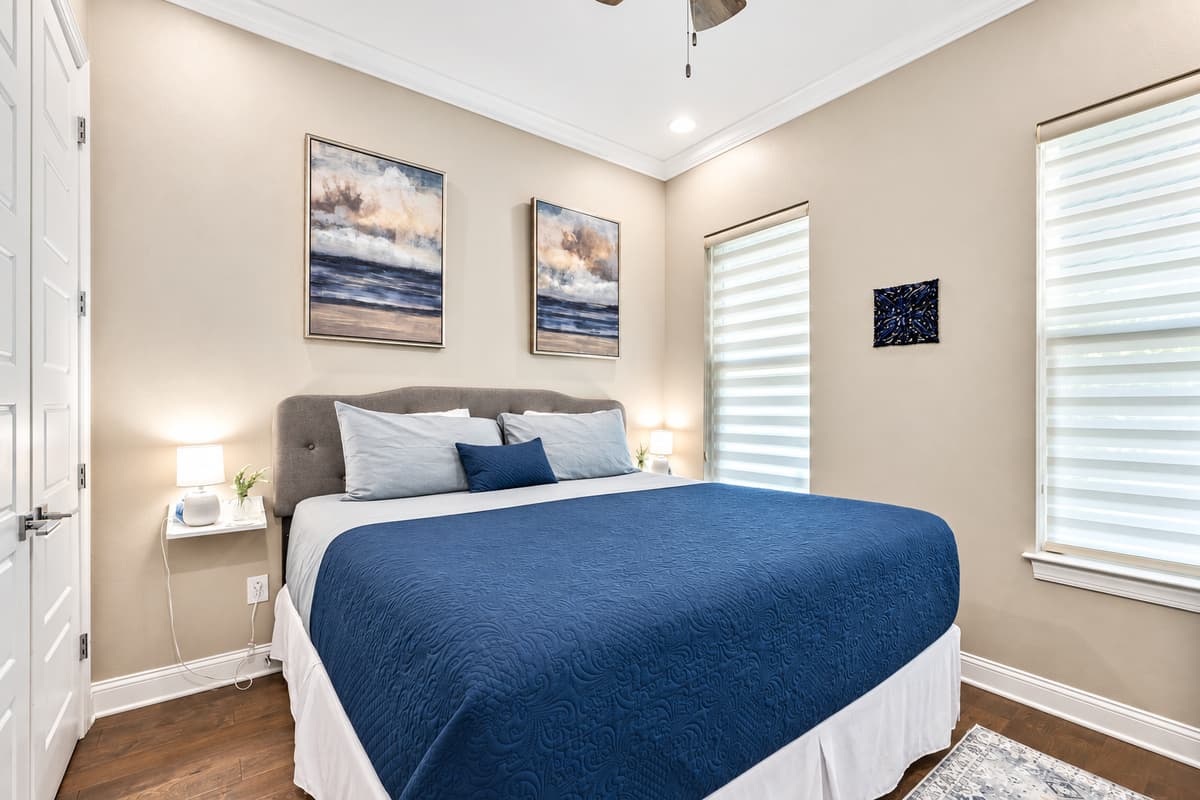 Experience the perfect blend of comfort and style as you unwind in the embrace of the queen-size bed and immerse yourself in the tranquil ambiance of this charming bedroom.