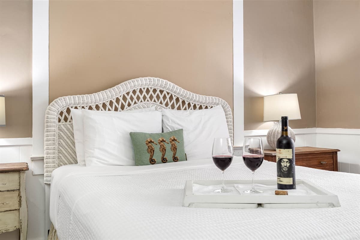 This spacious retreat features a luxurious queen-size bed, inviting you to unwind and recharge.