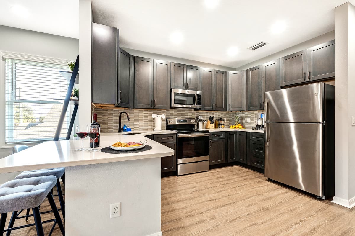 Ample cabinet space and cleverly designed storage areas provide not only functionality but also an opportunity for organization.