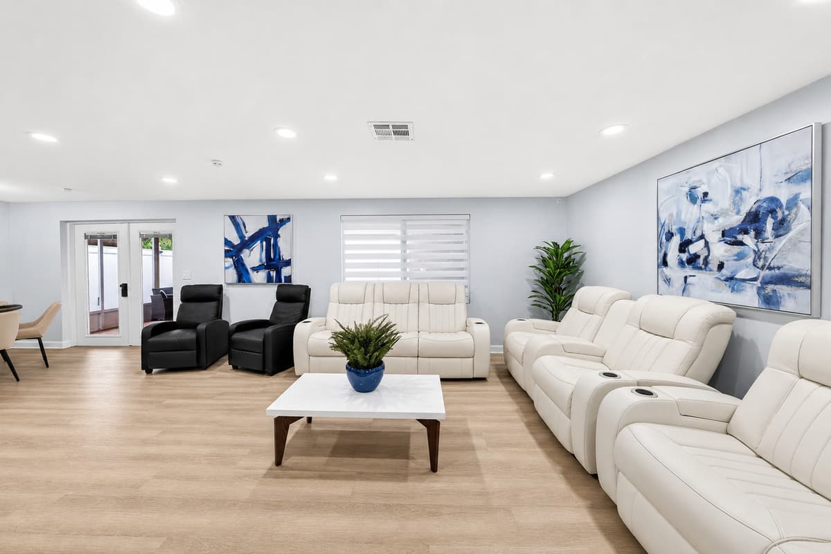 Expansive gathering space designed for groups and families, offering plenty of seating and room to relax together.