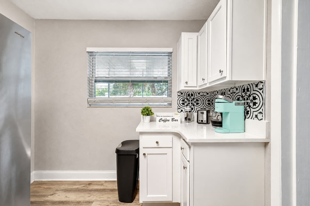 The expansive countertops offer ample space for meal preparation.