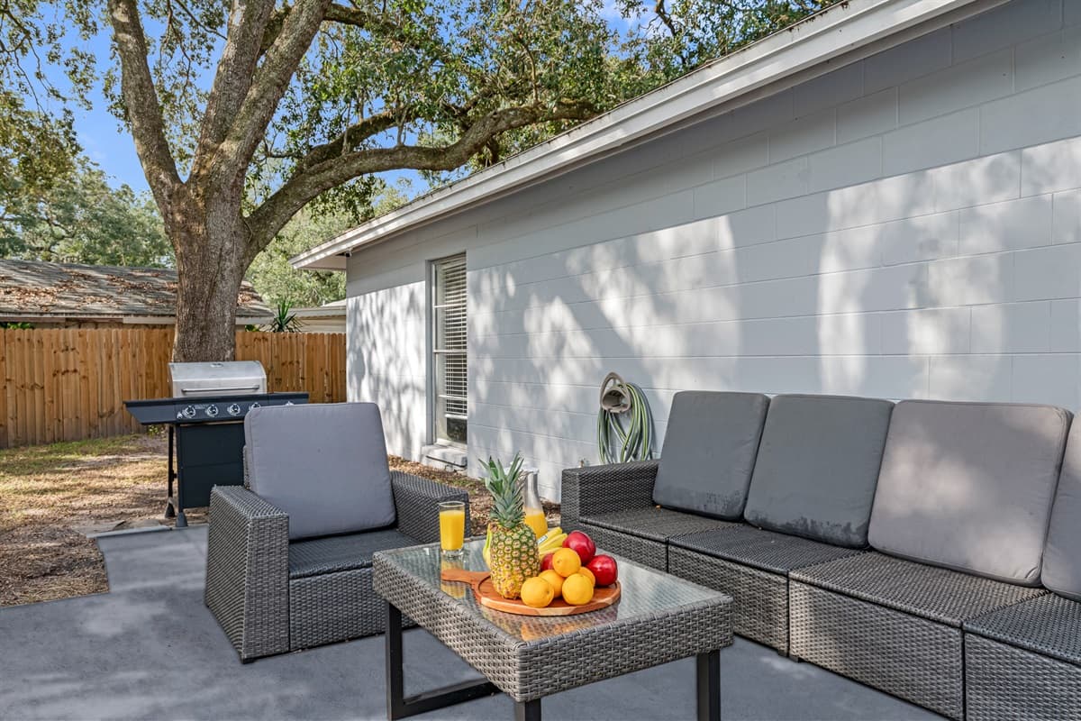 Enjoy good food while bonding with family and friends. Perfect backyard with comfortable sitting area and griller. Book this property now before someone else books the dates you want!
