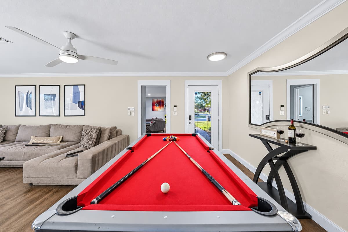Enjoy endless fun with the pool table just steps from the living room.