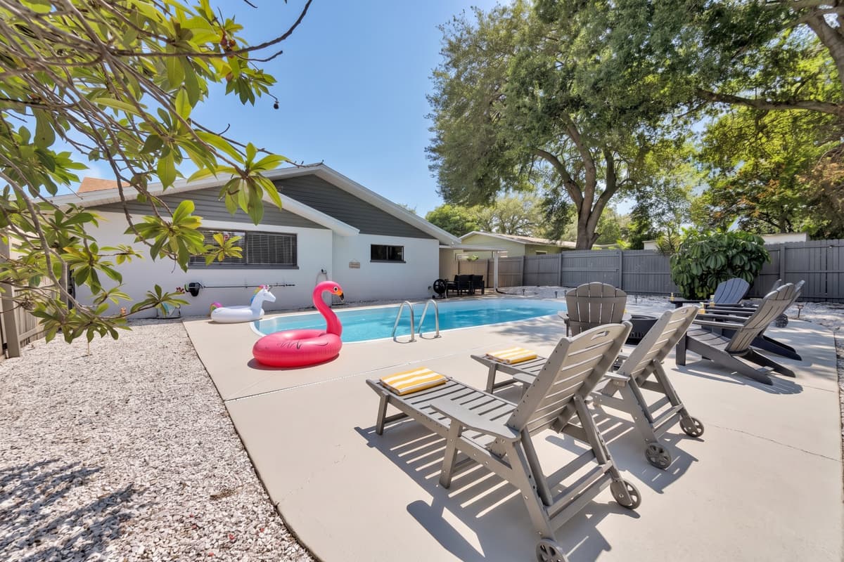 Florida afternoons get hot fast, and this is the answer waiting twenty steps from the kitchen. Cool water, warm deck, shade around the edges, and nothing between you and a swim except deciding to put your phone down.