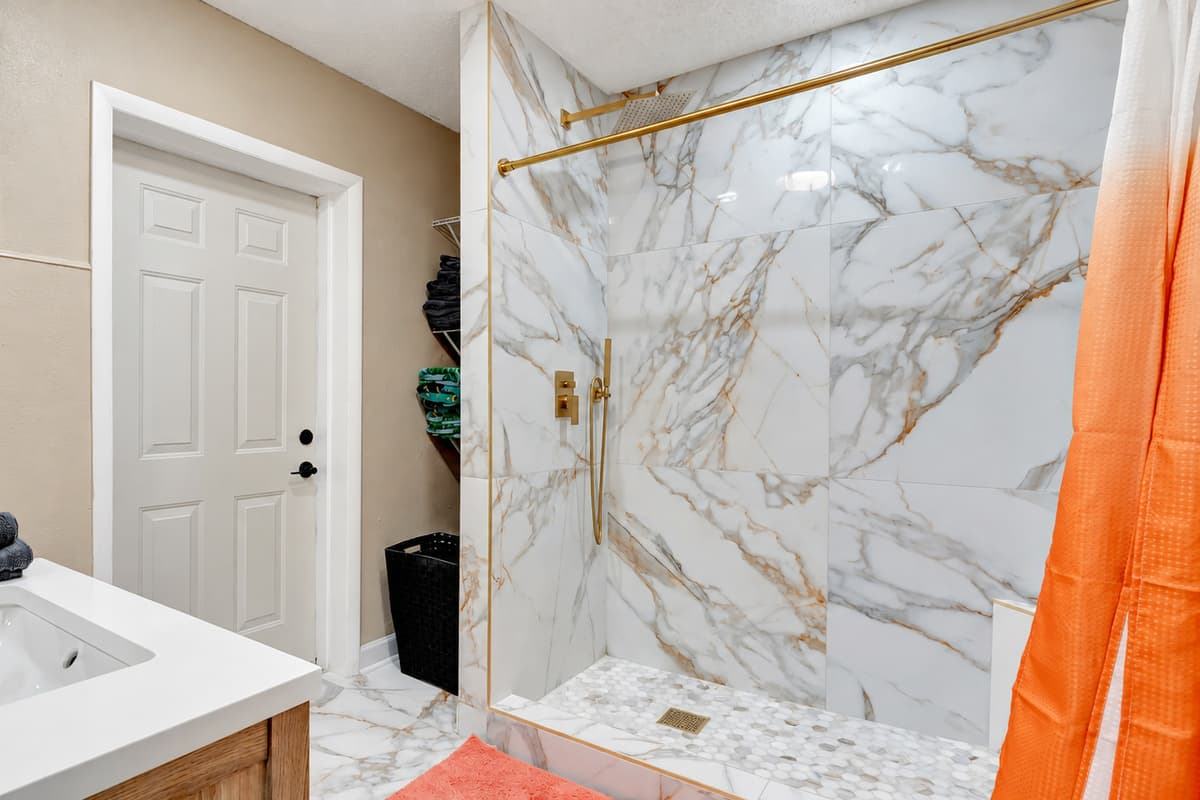 Enjoy the refreshing experience of a walk-in shower, promising both style and comfort in your daily routine.