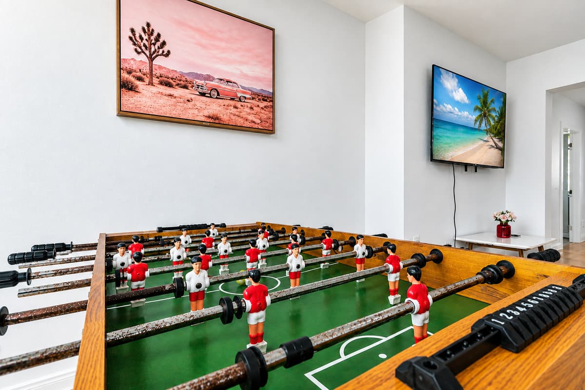Close-up of the foosball table entertainment area, perfect for family fun and friendly competition.