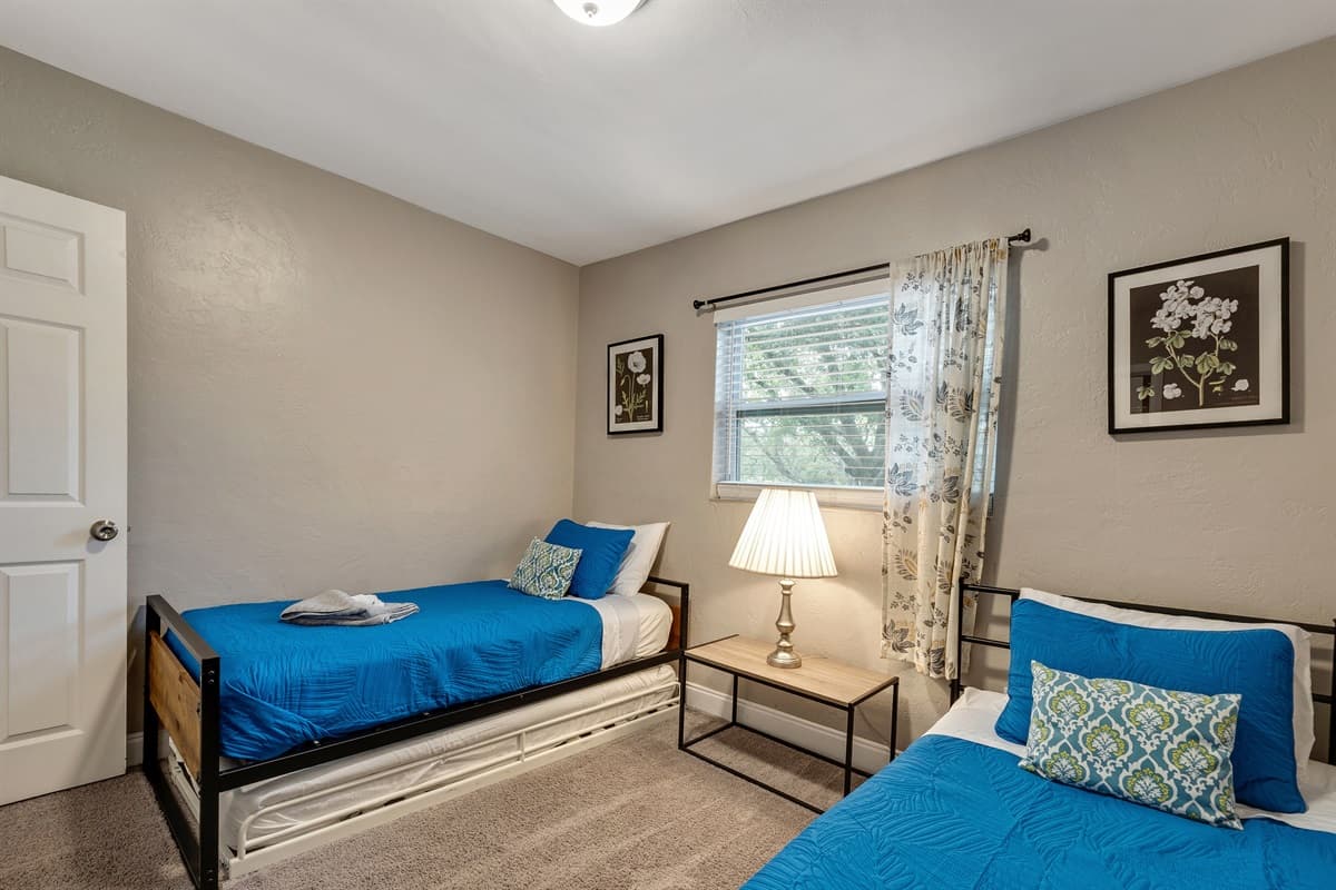 The room's ambiance is a delicate balance of sophistication and relaxation, where tasteful decor and soft hues create an atmosphere of timeless comfort.