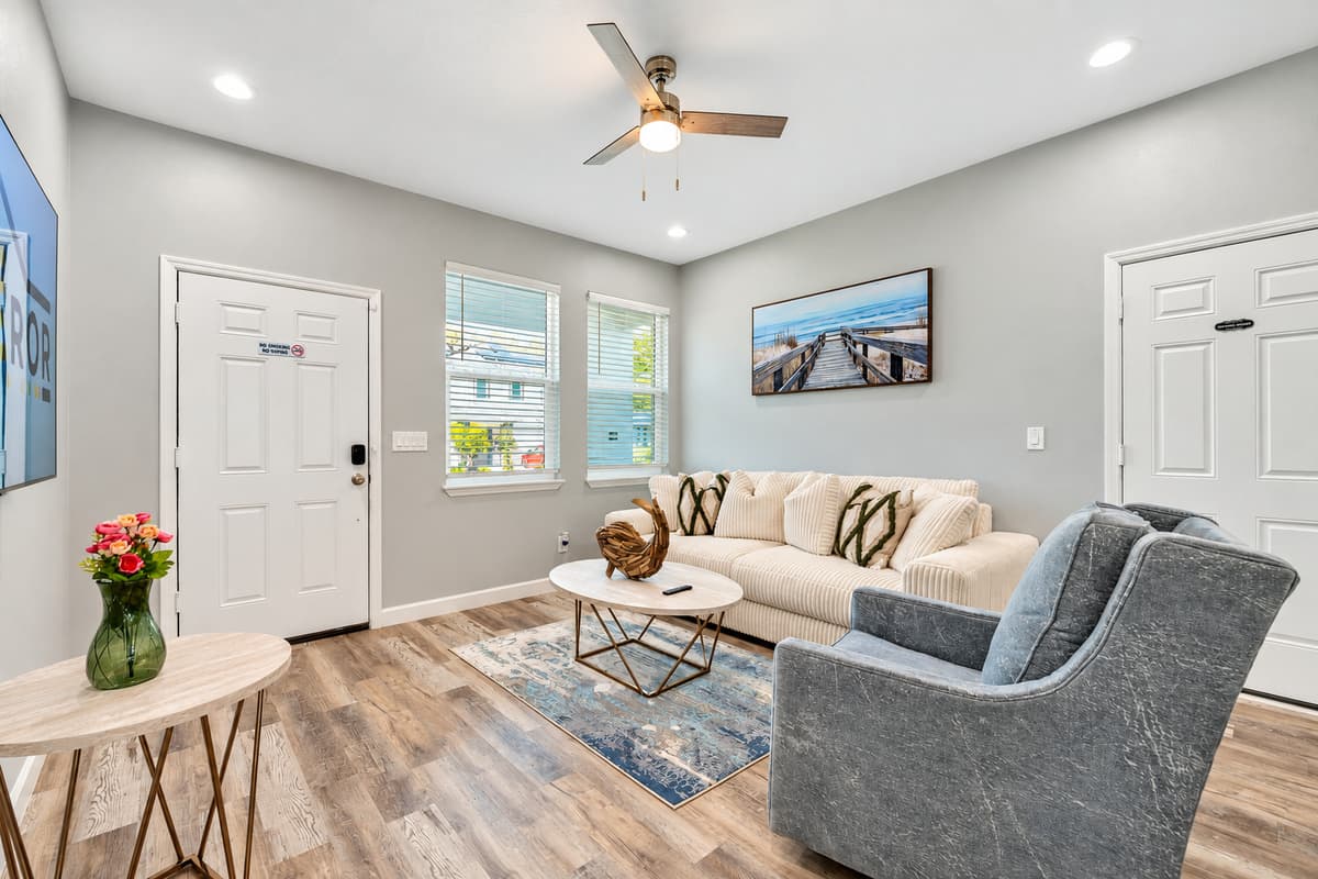 Soft, neutral tones and tasteful decor create a serene atmosphere, while luxurious textiles and tactile finishes add warmth and sophistication to the space.