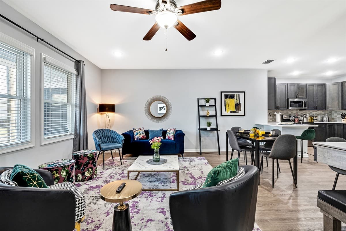The inviting ambiance is further enhanced by the carefully selected color palette and tasteful decor, creating a space that exudes both warmth and sophistication.
