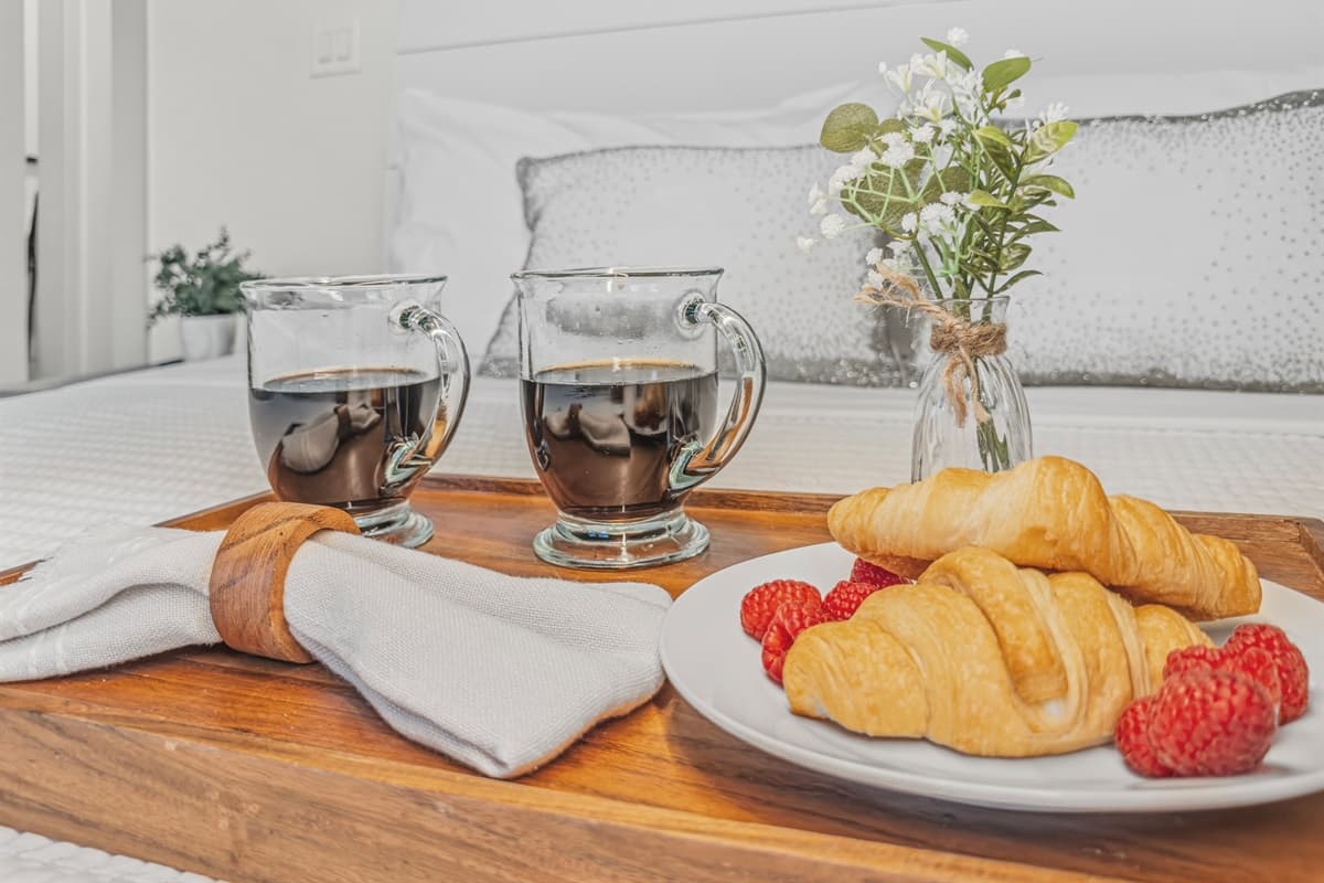 Golden croissants, fresh strawberries, and coffee — mornings don't get better than this! Every detail of this brand-new Seminole Heights home is designed to make your Tampa stay feel indulgent, memorable, and truly special.