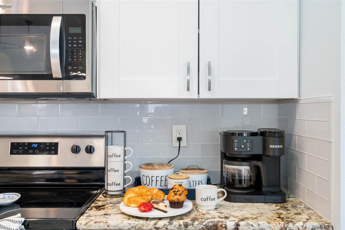 This kitchen is equipped with brand-new, state-of-the-art appliances designed to elevate your cooking experience.